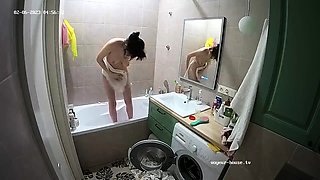 Sexy black amateur caught taking a shower on hidden cam