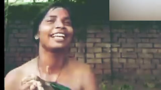Desi girl is taking a bath outside