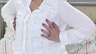 English Granny Jade M. Rubs Her Mature Pussy in Bed