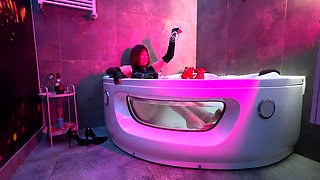 Mistress' Taking a Bath in Latex and Boots