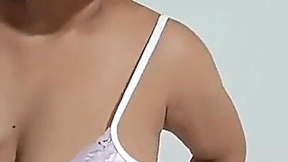 Chubby Brunette with Red Lips and Big Tits Doing What She Likes Most Receiving Cock