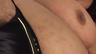 Big Breasted Mature Woman Rubs Her Unshaved Pussy in Bed