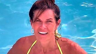 Busty curly brunette with big boobs fucks on couch