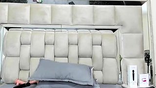 Hot amateur teen girl toying pussy in bed on webcam