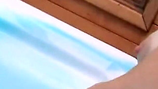 Curly-haired Babe Masturbates with Bottle in Hot Tub