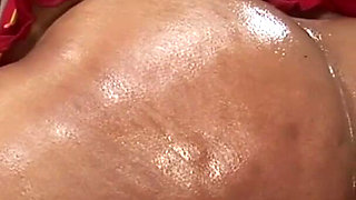 Oiled ebony babe gets fucked in her wet cunt