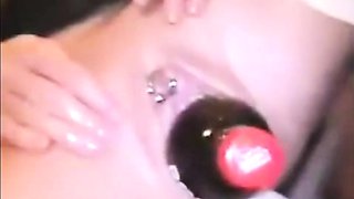 My large cunt filled with a big bottle