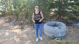 MILF Pissing in her jeans while exercising outdoor