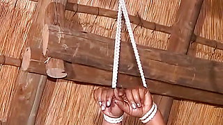 Mature ebony German bitch tied up and fucked by dildo