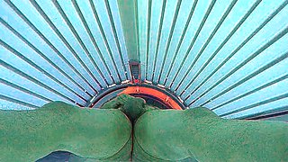 Masturbating in public tanning bed
