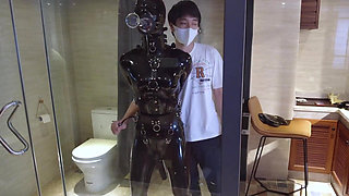 Mz20 - the Girl in Latex Clothing Locked in a Glass Room