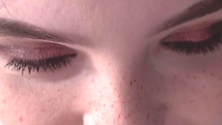 A Girl Is Messing with a Macro Camera