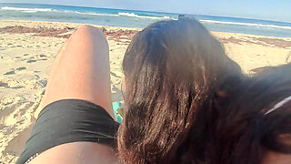 MILF Sucks Cock and Swallows Cum on the Beach POV