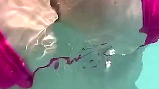 Artemisia Love Sexy and Horny Underwater Showing Her Big Tits in a Super Micro Bikini and You Can See Her Aureolas…