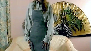 Brunette Strips and Toys Her Hairy Pussy with Dildo