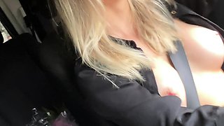 Blonde is flashing her big boobs in the outdoors