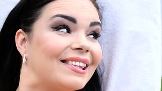 Attractive brunette teenager with big boobs fingering pussy