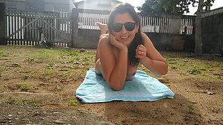 Wife sunbathing naked in front yard