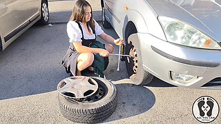 Dirndl Slut Gets Dirty and Oily Changing Tires