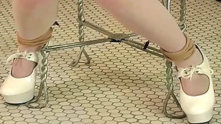 Mature Nurse Joins Doctor for Intense Patient Examination