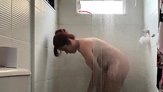 Day 8 #Voyeur - She is taking a shower, her body is