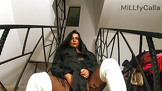 Black Downjacket Fetish on the Stairs. Bodystocking, Shiny Boots and Intimate Tease