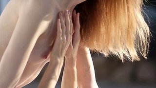 Two sweet teen girls intimate lesbian action outdoors