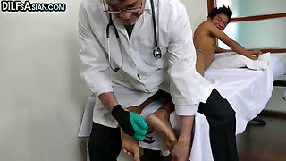 Gay doctor fucks a young Asian boy bareback after an anal checkup