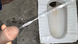 Desi Bhabhi Holding Stepbrother-in-law's Penis and Making Him Pee and Peeing Herself