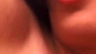 Sexy Brunette Plays with a Sex Toy