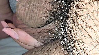 Step mom grabs and squeeze step son balls in bed