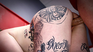 Tatted blonde PAWG wrestles and fucks hard on the mats