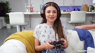 A gf plays a video game while her BF gets it on with her best friend