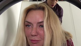 Alla Peek in sexy lingerie and stockings, giving a blowjob