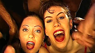 Wild Bukkake Orgy: Two Collared Sluts Get Faces Drenched in Cum!