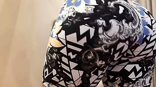 Twerking in gym shorts and bouncing his bootie on the chair