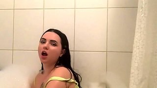 Bubble Bath Time for This Tattooed Brunette