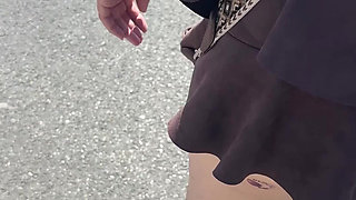 Exhibition in Micro Skirt in Public and Anal Plug