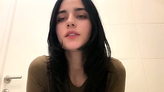 Amateur young brunette enjoys dildo on solo masturbation