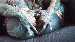 Gorgeous tattooed girl fucks her ass with a big dildo