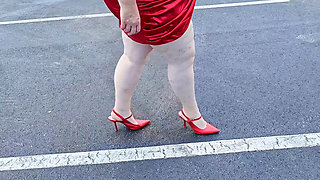 Beautiful Woman Walking Outdoors in Parking Lot Showing off for Strangers