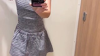 Asian slut changing clothes in shops and shows all her perks