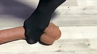 Sexy Dominatrix in Nylon Pantyhose Is Trampling Your Cock