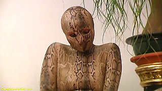 Big boob blonde girl in skintight spandex snake catsuit stripping for you