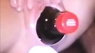 My large cunt filled with a big bottle
