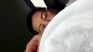 Asian MILF Gives a Handjob in a Car