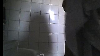big boobed stepmom spied in the bathroom