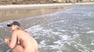 Playing at the nude beach.
