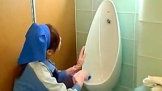 Asian toilet attendant cleans wrong part2