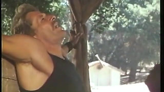 Beutiful girl sucking one cock and getting fucked from behind on outdoor benches